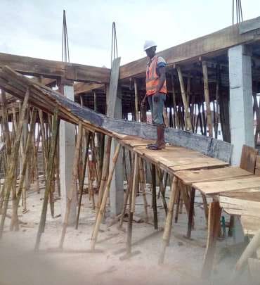 Timber ramp and formwork supporting the upper floor — Lakeview Park, Lekki, Lagos