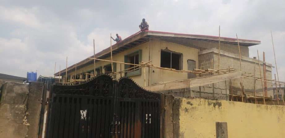 Before: original office facade viewed from the street — Oluwaleimu Street, Ikeja, Lagos